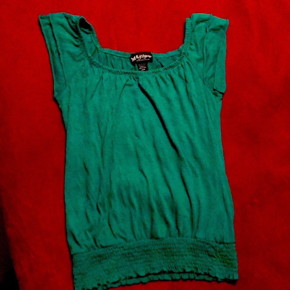 Emerald green sleeveless shirt with banded bottom